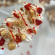 Croffle with cream, strawberries, and cheesecake chunks